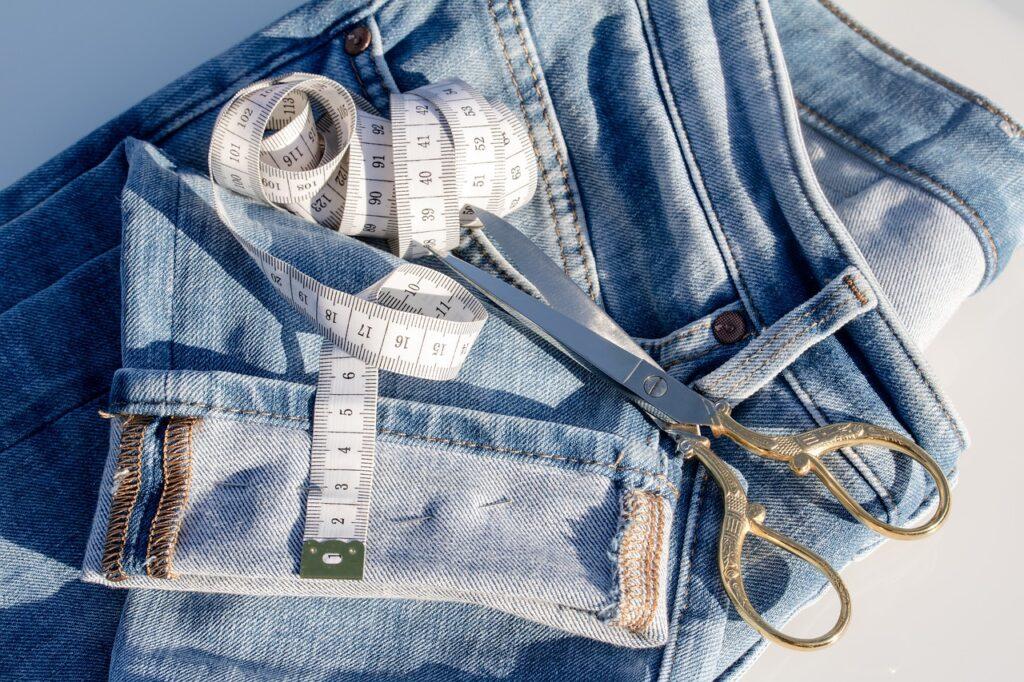 jeans, tape measure, fabric scissors