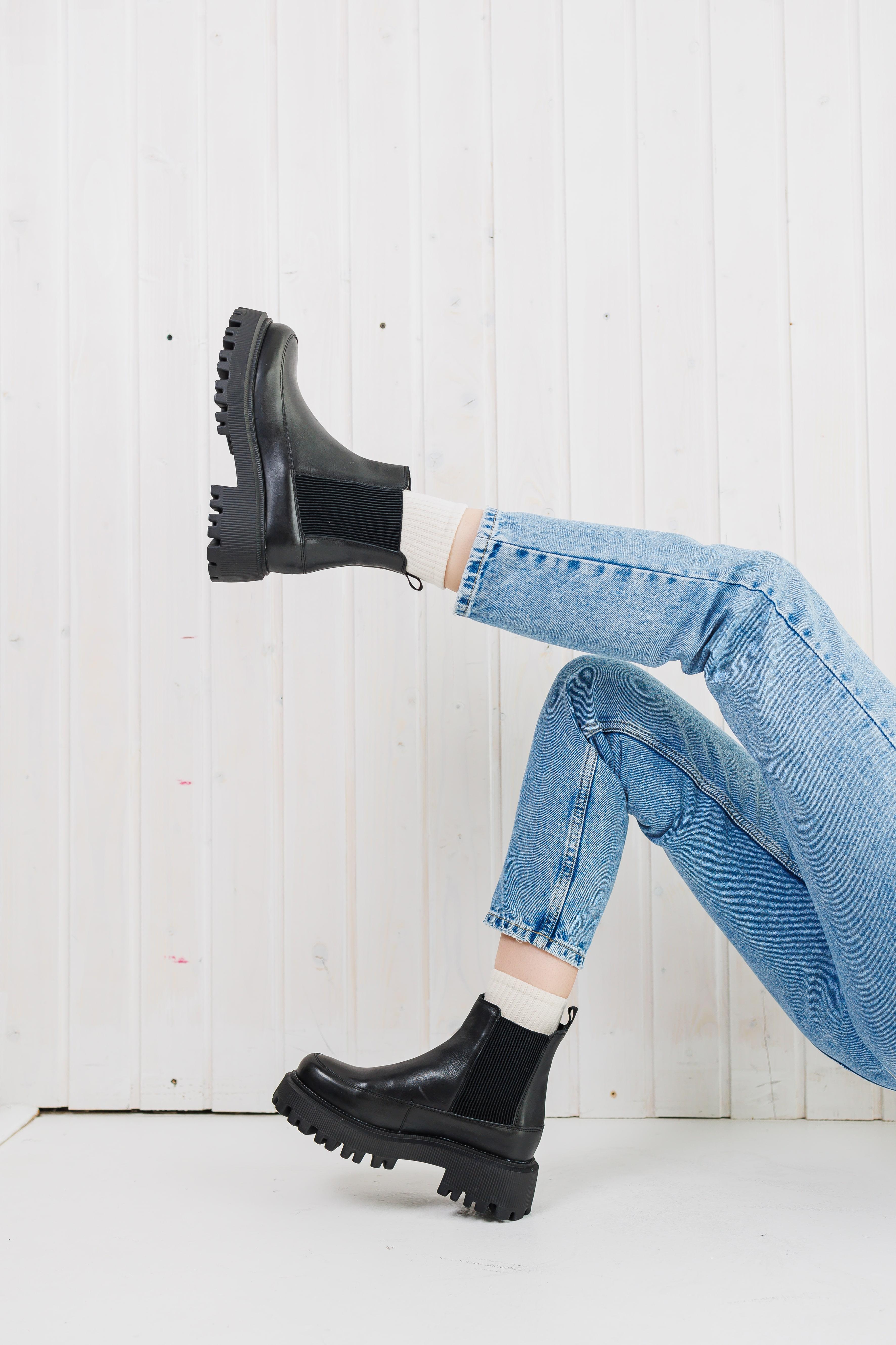 How to Wear Black Boots with Jeans